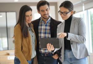 a property lawyer discussing the risks and rewards of e-conveyancing to her clients