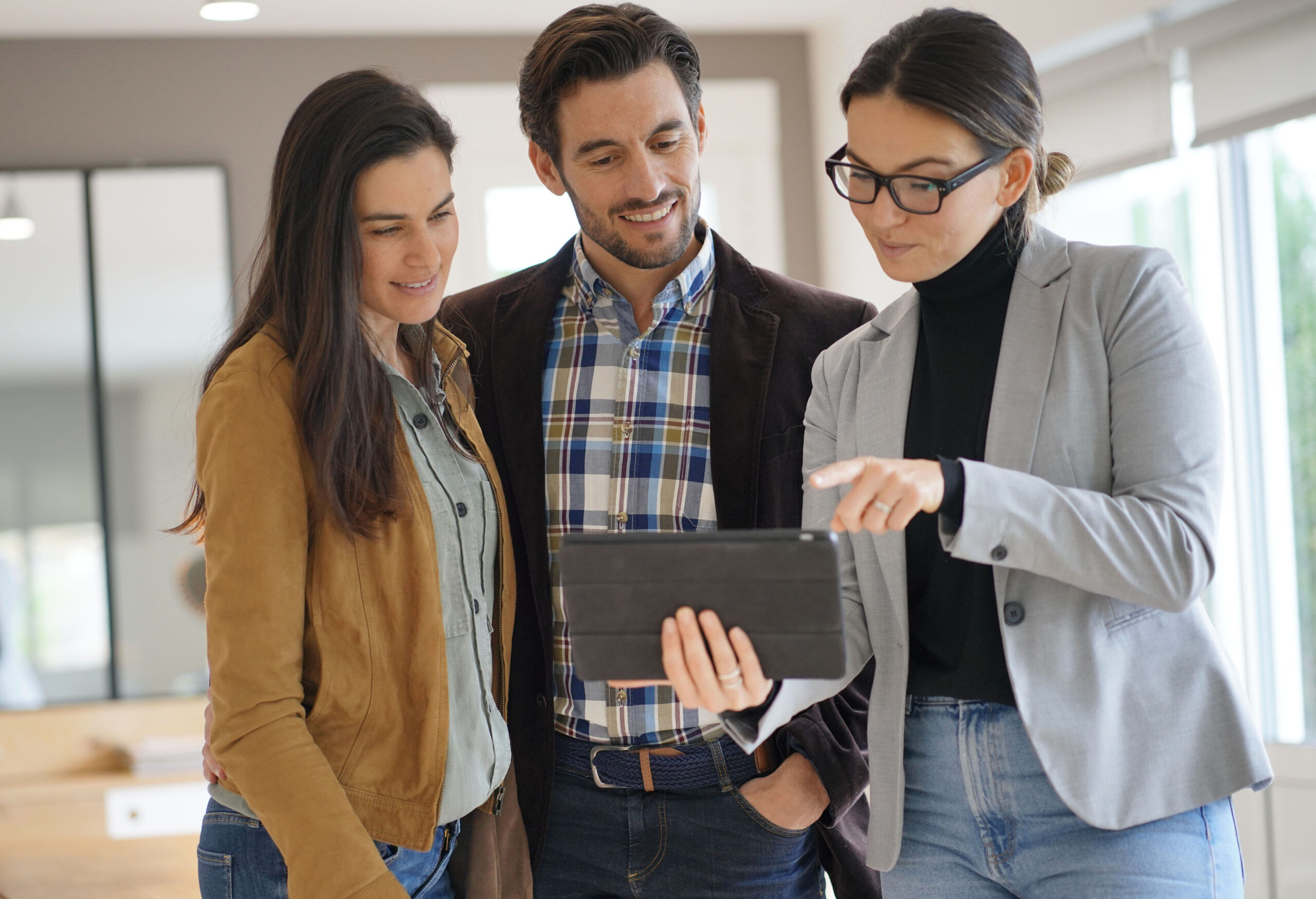 a property lawyer discussing the risks and rewards of e-conveyancing to her clients